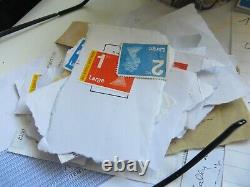 Unfranked uk stamps on paper only APPROX £600 face value + special delivery